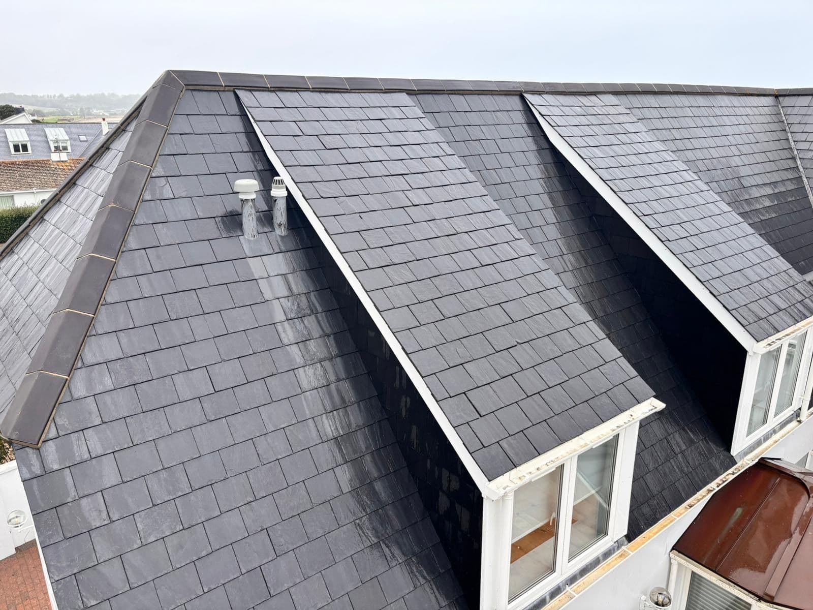 Slate roof with dormer windows after a Premier Facilities clean