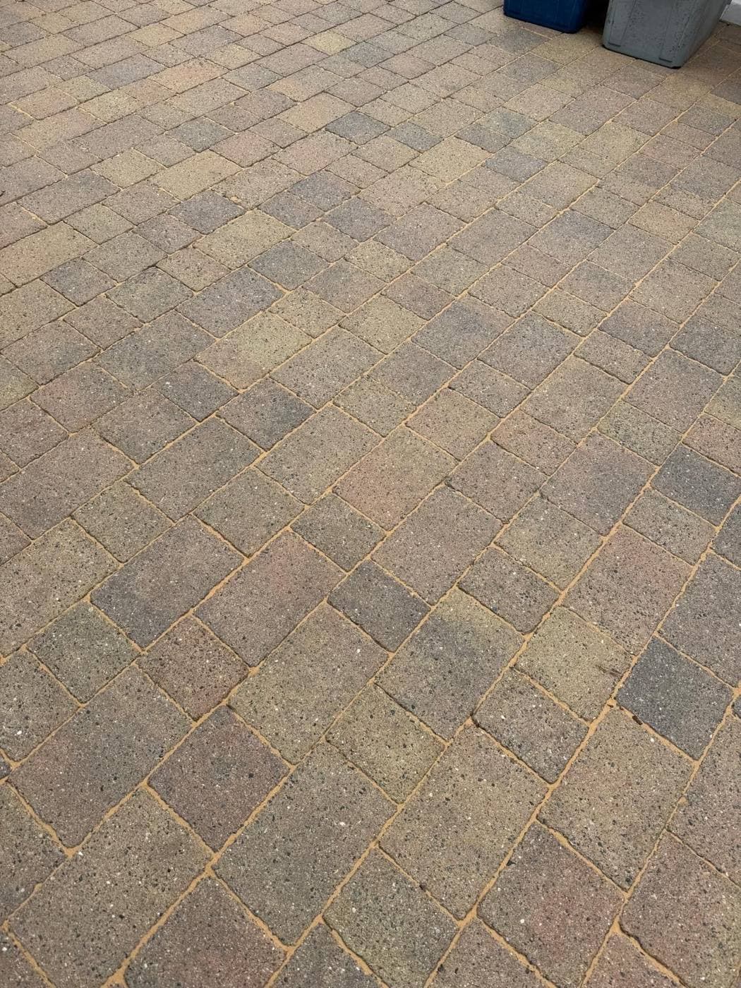 Block paving after cleaning, with fresh sand in the joints